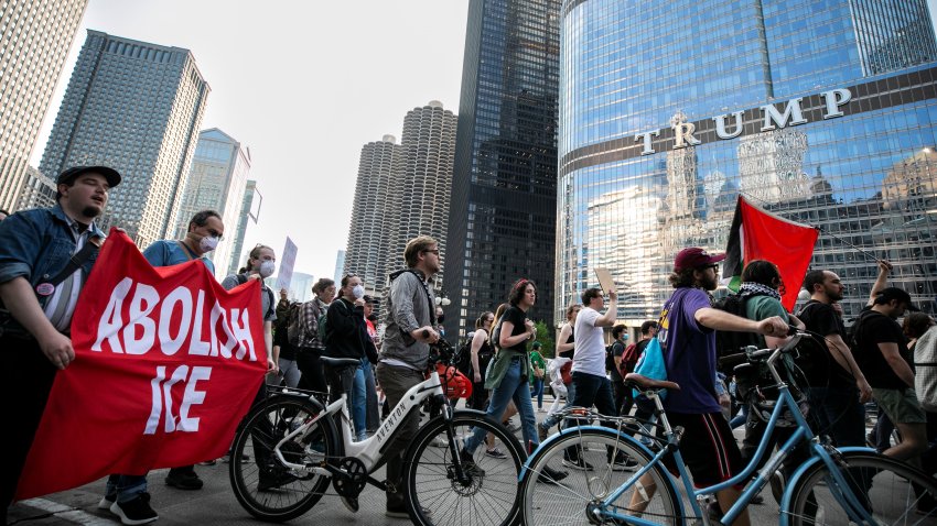 Anti-ICE protesters holding banners are pictured on State Street in downtown Chicago, the United States, June 10, 2025. Demonstrations against the Trump administration’s immigration crackdown have intensified and spread far beyond Los Angeles, with thousands of people gathering in at least two dozen cities by Tuesday night, U.S. media reported.   TO GO WITH “Roundup: Protests expand beyond LA to dozens of U.S. cities” (Photo by Vincent D. Johnson/Xinhua via Getty Images)