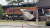 Suburban rail crossing closed after train collides with semitruck
